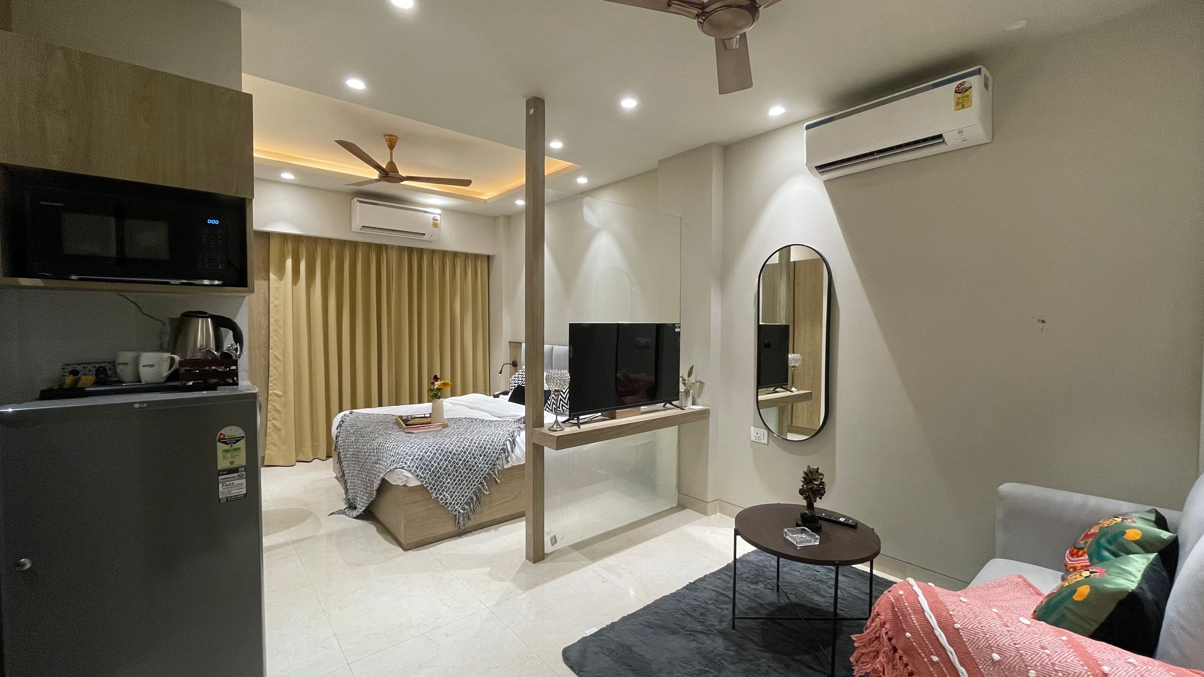 Stayo Rooms Golf course Road - Tap to explore photos