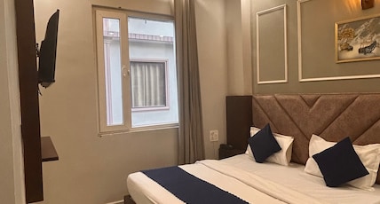 Hotel Mahadev Palace Room Type - Deluxe Room with City View | Ideal for 2 Guests Hotel Mahadev Palace Room Type - Deluxe Room with City View | Ideal for 2 Guests