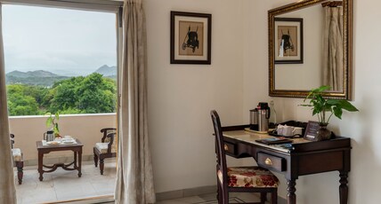 Akshay Niwas Hotel by Amantra | Pool & Lake Room Type - Royal Suite With Large Sitout Balcony (440 Sq ft) Akshay Niwas Hotel by Amantra | Pool & Lake Room Type - Royal Suite With Large Sitout Balcony (440 Sq ft)