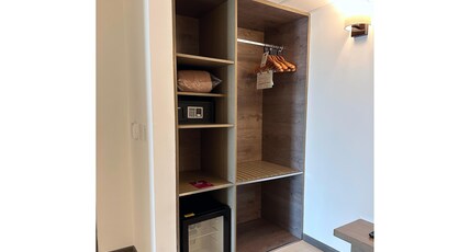 BEST WESTERN PLUS URBAN LARCO Room Type - Suite-1 King Bed, Non-Smoking, Junior Suite, High Speed Internet, Safe, Mini Bar, Sofabed, Full Brea BEST WESTERN PLUS URBAN LARCO Room Type - Suite-1 King Bed, Non-Smoking, Junior Suite, High Speed Internet, Safe, Mini Bar, Sofabed, Full Brea