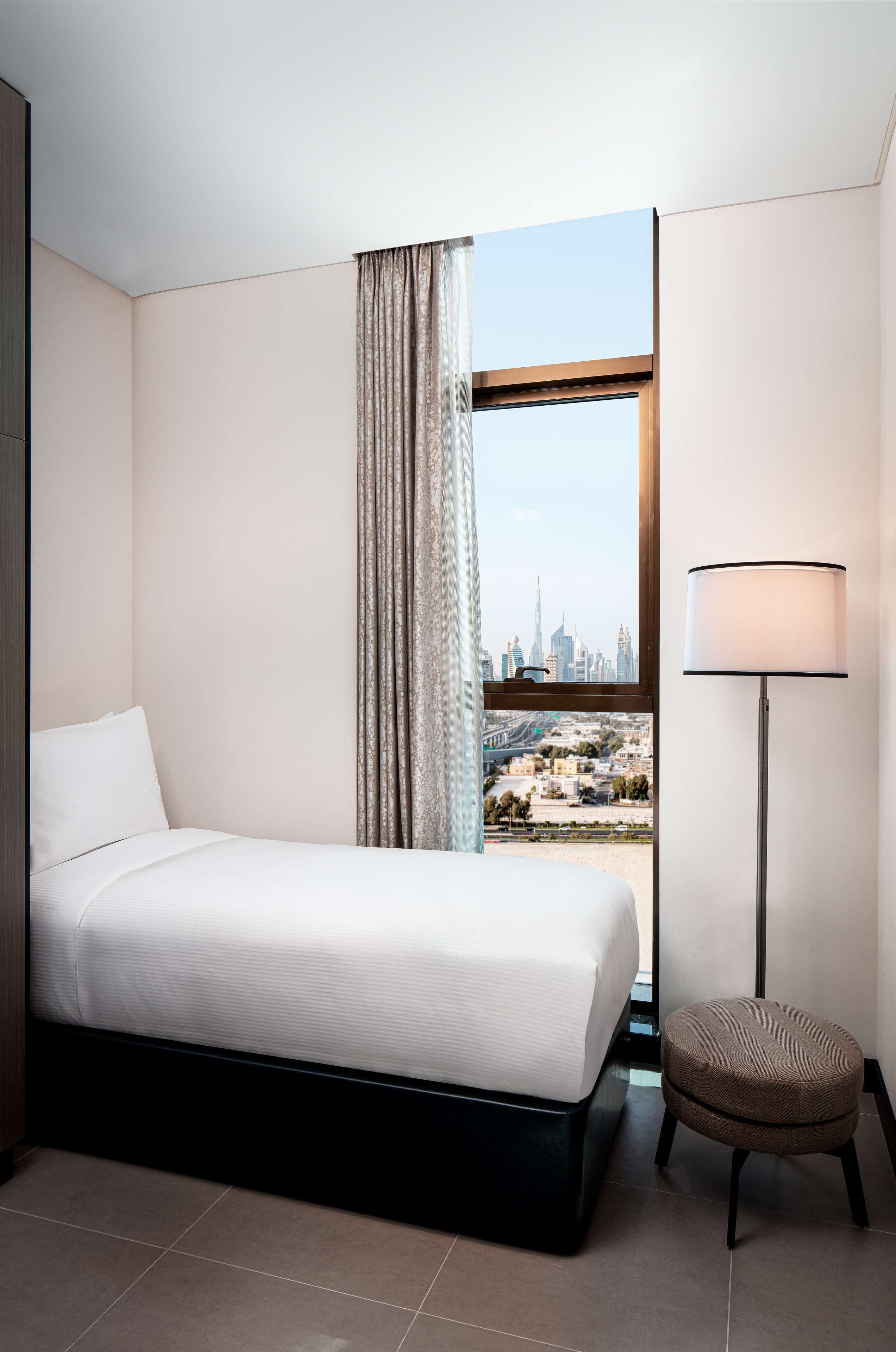 DoubleTree by Hilton Dubai M square Hotel & Residences - Tap to explore photos