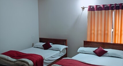 COORG CITY SCENERY HOMESTAY. Room Type - Deluxe Non AC Family Room 2
