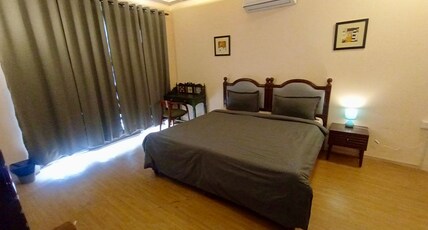 Sliceinn Flamingo Room Type - 103 - Premium bedroom with attached bathroom and common balcony