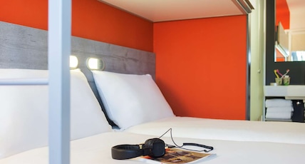 ibis budget Amsterdam Airport Room Type - Standard Room with 2 single beds and a bunk bed ibis budget Amsterdam Airport Room Type - Standard Room with 2 single beds and a bunk bed