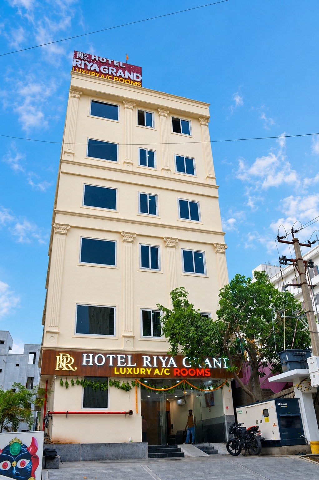Hotel Riya Grand - Tap to explore photos