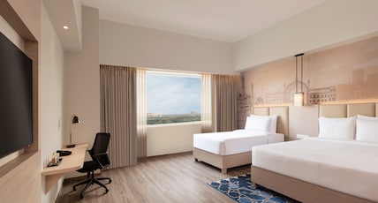 Mercure Lucknow Gomti Nagar - An AccorHotels brand Room Type - Classic Suite with 1 double bed + 1 single bed and sofa Mercure Lucknow Gomti Nagar - An AccorHotels brand Room Type - Classic Suite with 1 double bed + 1 single bed and sofa