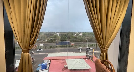 Manoranjan Enclave Room Type - Luxury Room with Highway View
