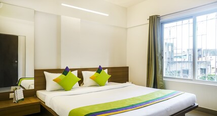 Treebo Luxe Suite, Shivaji Nagar Room Type - Deluxe Family Room with Living Area