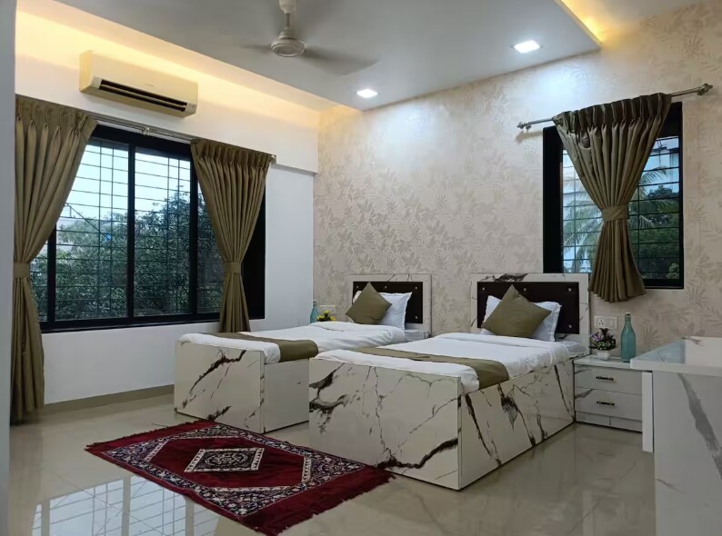 Tulsi Home Aesthetic Deluxe Room with attached bathroom - Tap to explore photos