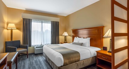 Best Western Plus University Park Inn & Suites Room Type - Accessible - Suite King Bed, Mobility Accessible, Bathtub, Sofabed, Non-Smoking, Full Breakfast Best Western Plus University Park Inn & Suites Room Type - Accessible - Suite King Bed, Mobility Accessible, Bathtub, Sofabed, Non-Smoking, Full Breakfast