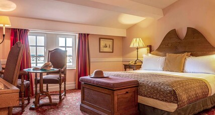 Hotel de la Cite Carcassonne - MGallery Collection Room Type - Classic Room - a king-size bed, view of the city streets