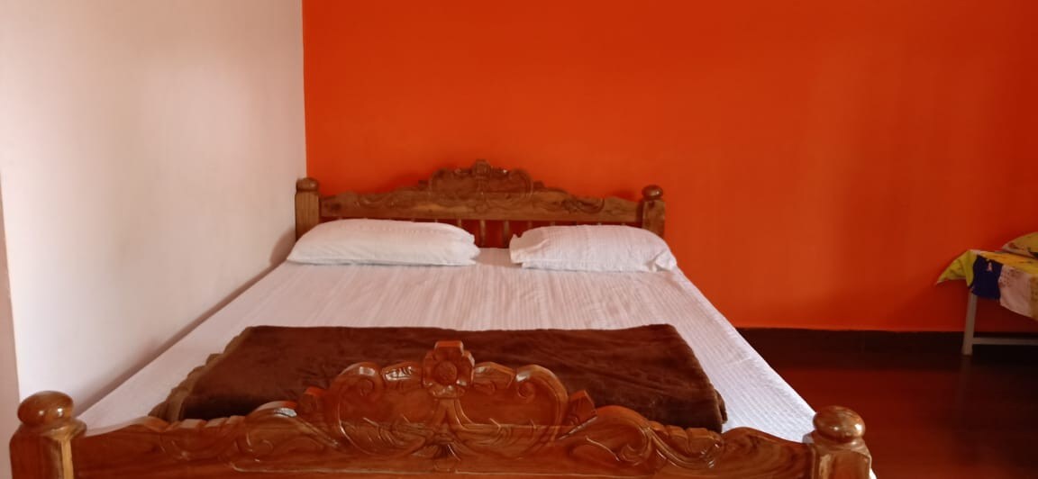 Sakthi Homestay | Rooms & Caretaker - Tap to explore photos