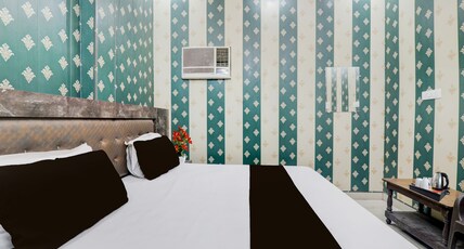 Hotel O Saryu Ghat Formerly Balaji Palace Room Type - Deluxe with Balcony Hotel O Saryu Ghat Formerly Balaji Palace Room Type - Deluxe with Balcony
