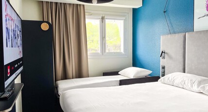 ibis Nimes Ouest Room Type - Standard room with a double bed and a bed for kids under 12