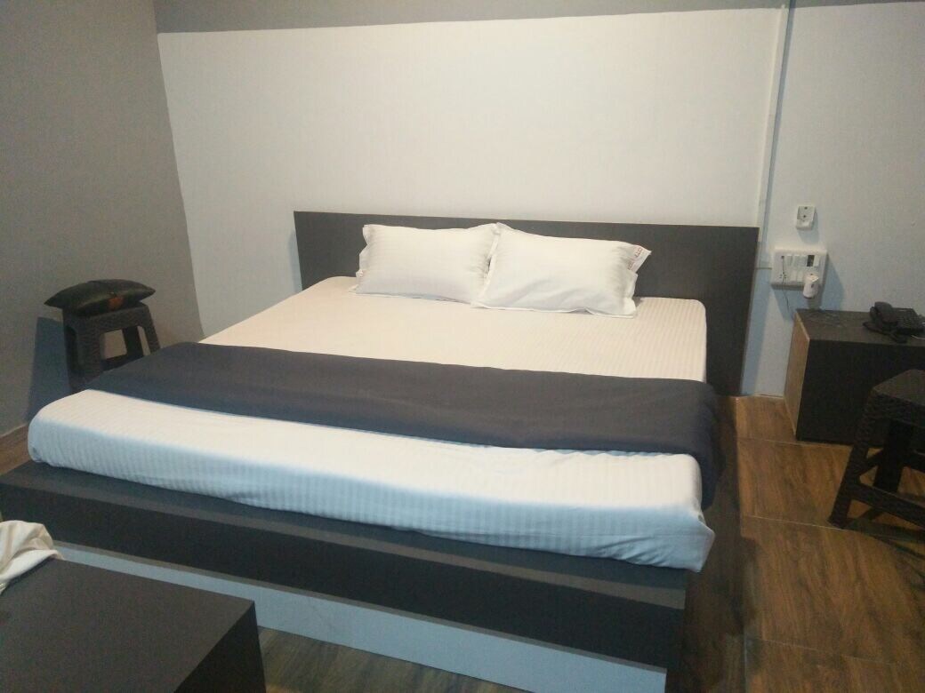 ASHRAY HOTEL - Tap to explore photos