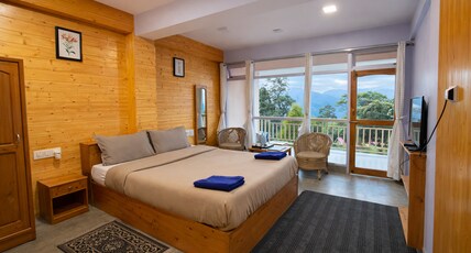 Shikher Guest House Room Type - Deluxe Room