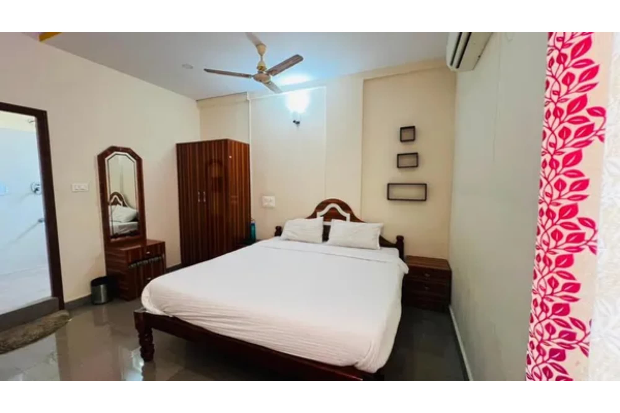 FabHotel Sangama Comfort - Tap to explore photos
