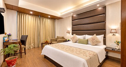 The JK Luxe Stay - Near Nehru Place And CR Park Room Type - Premium Room with Balcony and City View The JK Luxe Stay - Near Nehru Place And CR Park Room Type - Premium Room with Balcony and City View