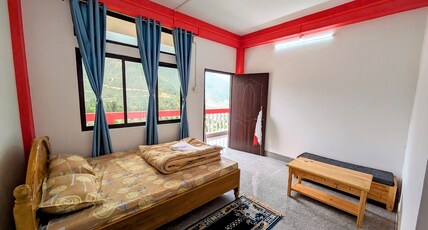 lhamu homestay Room Type - double bed room with hills view