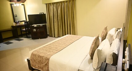 Hotel Pushpak Room Type - Super Deluxe Room