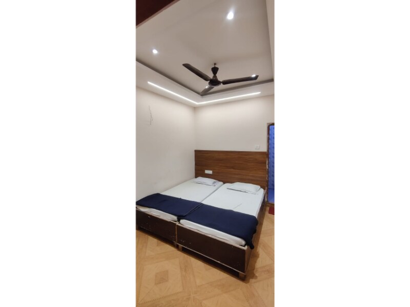 New Swastik Guest House - Tap to explore photos