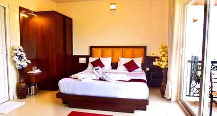 HOTEL COORG PALACE INN Room Type - Super Deluxe Room With Balcony
