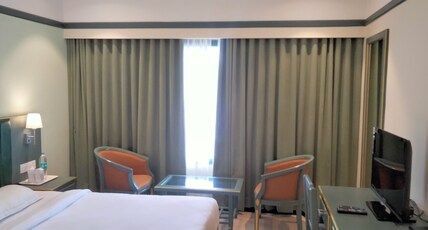 Hotel Elegance Karukutty Angamaly Room Type - Deluxe Room Non-Ac