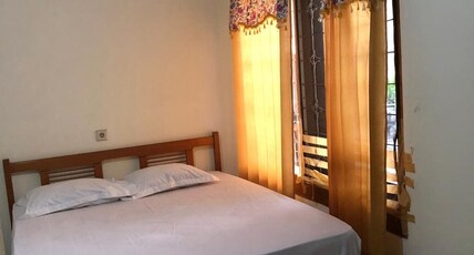 Hotel O Rumah Oma Syariah Room Type - Monthly standard Double Room