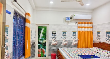 Pakhi Guest House Room Type - Deluxe Room with AC