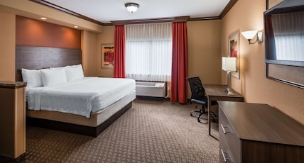 Best Western Plus North Canton Inn & Suites Room Type - Suite-1 King Bed, Non-Smoking, Living Room, Sofabed, Flat Screen Television, Microwave And Refrigera Best Western Plus North Canton Inn & Suites Room Type - Suite-1 King Bed, Non-Smoking, Living Room, Sofabed, Flat Screen Television, Microwave And Refrigera