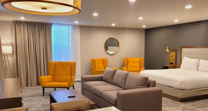 The Riverside Hotel, BW Premier Collection Room Type - Suite-1 King Bed, Non-Smoking, Sofabed, View, Jetted Tub, Living Room, Microwave And Refrigerator, F