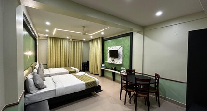 Hotel Swagatam International Room Type - AC Premium Four Bed Room with Balcony Hotel Swagatam International Room Type - AC Premium Four Bed Room with Balcony
