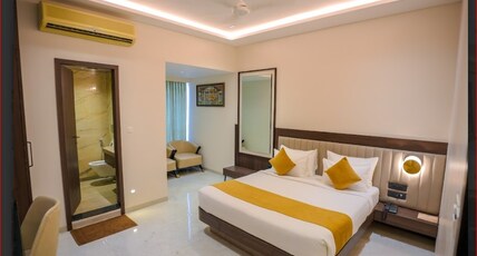 Hotel Surabhi Room Type - SUPER DELUXE KING ROOMS Hotel Surabhi Room Type - SUPER DELUXE KING ROOMS