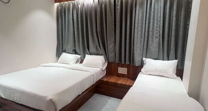 The Rudraksh - ( 200 Meter From Sai Samadhi Temple ) Room Type - Triple Bed Room