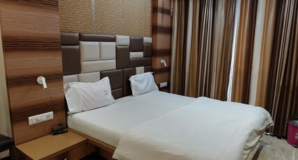 Hotel Nisarg Loding Room Type - Deluxe AC Hotel Nisarg Loding Room Type - Deluxe AC
