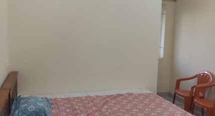 Giri's Residency Room Type - Bedroom 101