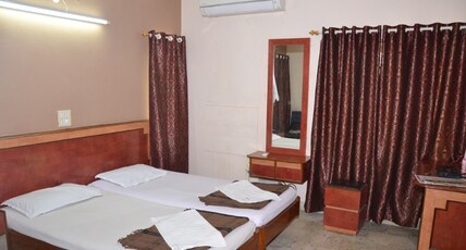 Hotel Saptagiri Deluxe Room Type - NON AC Room