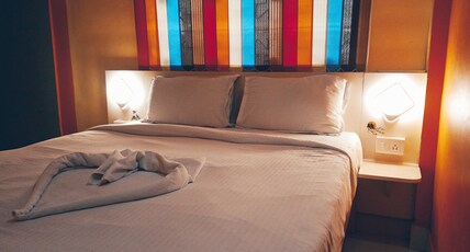 TRIDHARA Homestay | Rooms & Restaurant Room Type - Deluxe AC Queen Room