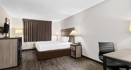 SureStay Hotel by Best Western Albuquerque Midtown Room Type - 1 King Bed, Non-Smoking, Flat Screen Television, Microwave And Refrigerator, Full Breakfast SureStay Hotel by Best Western Albuquerque Midtown Room Type - 1 King Bed, Non-Smoking, Flat Screen Television, Microwave And Refrigerator, Full Breakfast
