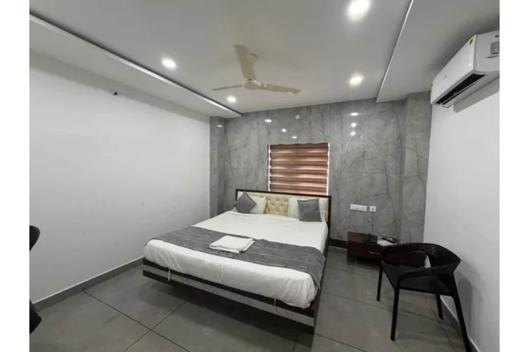 FabHotel Sushmitha Inn - Tap to explore photos