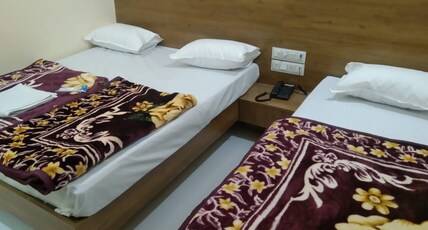 Ganesh Guest House Room Type - 4 BED AC