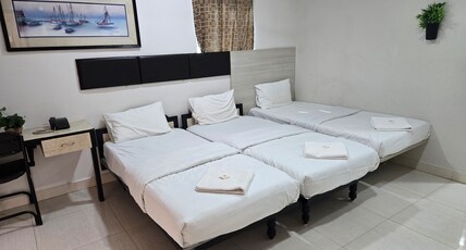 KODALI GUEST SUITES Room Type - Triple Occupancy Deluxe