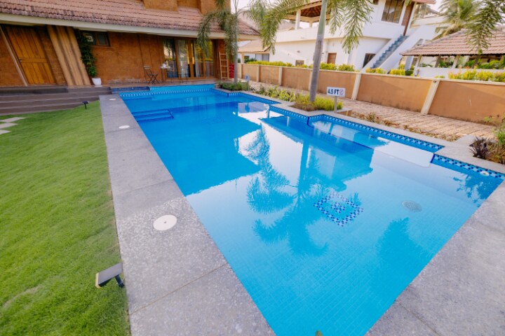 Hireavilla | Lahari Chic 4BR Beachfront Villa - Tap to explore photos