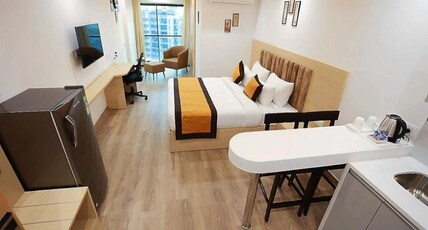 the grand anukampa hotel nitya studio apartments Room Type - Super deluxe 