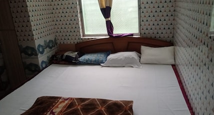 Deluxe Guest House Room Type - AC Big size Room (Room No. 02) with Large Bed for 4 persons Deluxe Guest House Room Type - AC Big size Room (Room No. 02) with Large Bed for 4 persons