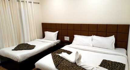 GRAND KODAI SR INN Room Type - Family Room