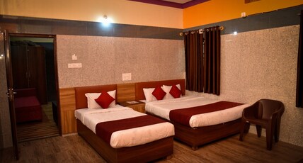 Sree Varada International Room Type - Deluxe AC Room