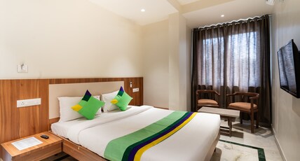 Treebo Kaveri Room Type - Deluxe Room