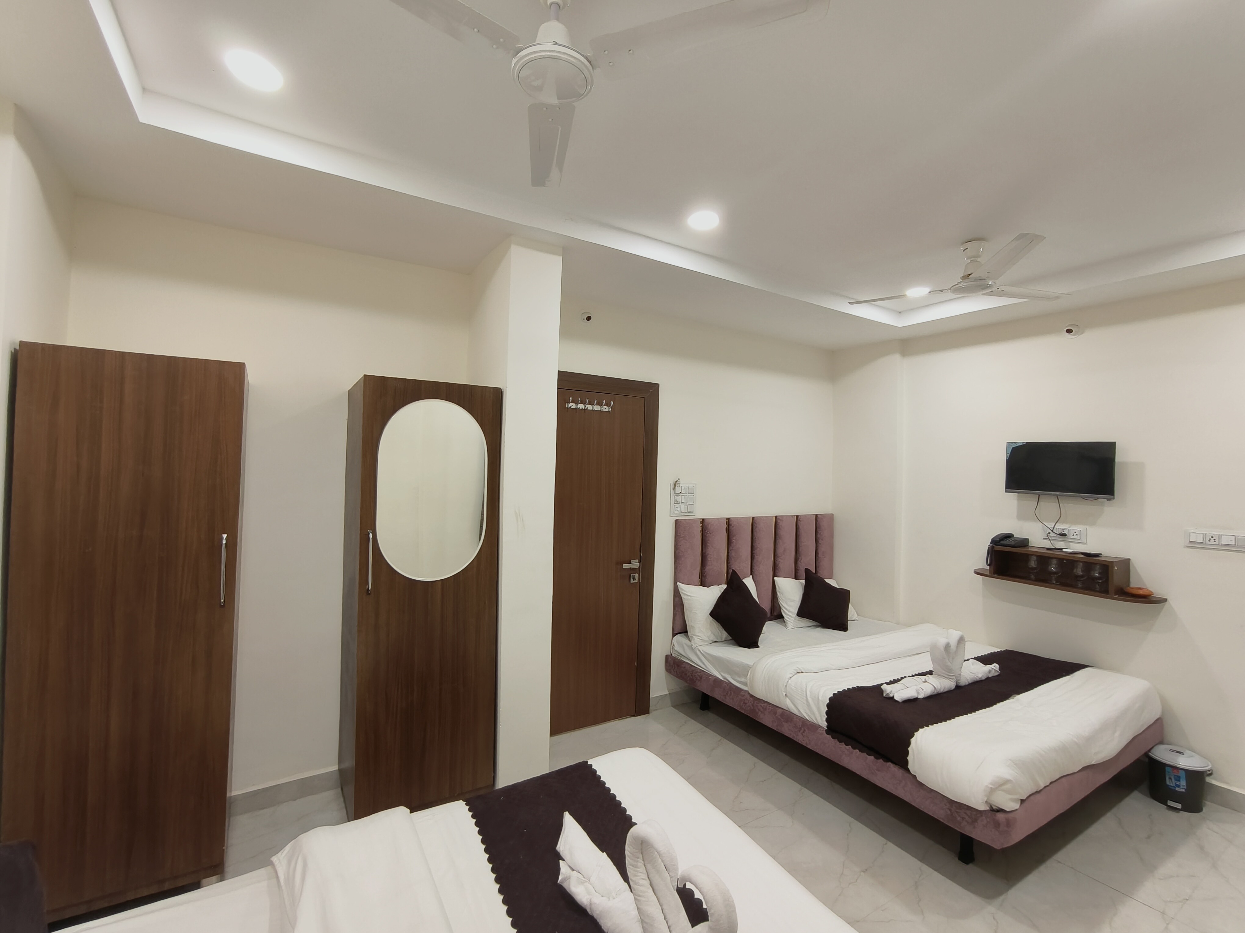 Hotel Tatvam Stays - Tap to explore photos