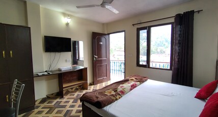 Sandhyana Inn near Bhagsu Waterfall Room Type - Family Room with Balcony and Mountain View
